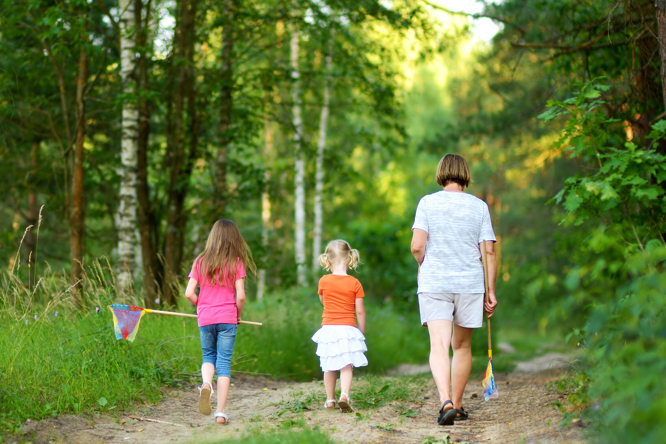 A man stares out of the window contemplating how his family will be taken care of after he passes and how to make sure they are properly prepared for his end of life transition